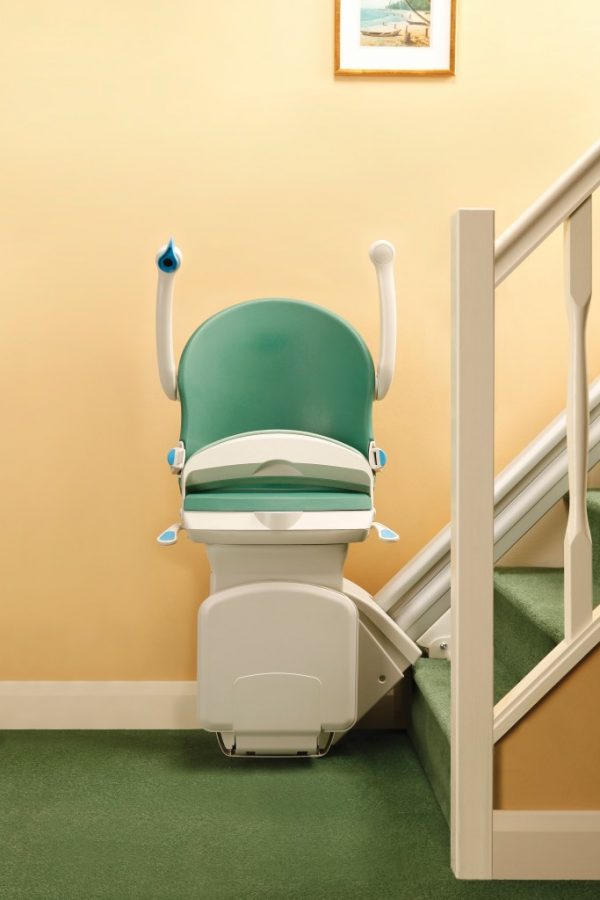 Handicare 1000 stairlift in green and folded up