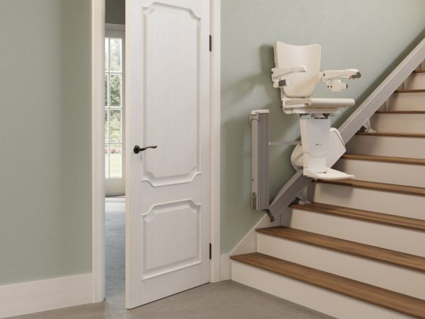Handicare 1100 Stairlift moving up the stairs