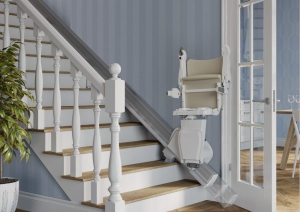 Handicare 1100 Stairlift folded at the bottom of the stairs