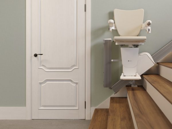 Handicare 1100 Stairlift moving up the stairs