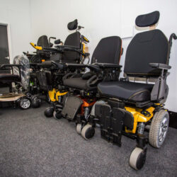 Powered wheelchairs on display in Ideas in Action's showroom.