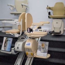 Stairlifts on display in Ideas in Action's showroom.
