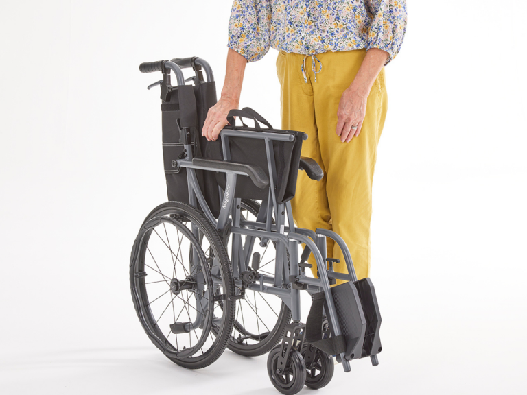 Motion Healthcare Magnelite Wheelchair - folded
